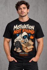 Male model wearing a black Motivation Not Found graphic T-shirt
