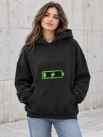 Female model wearing a black Social Battery Recharging women's hoodie, front view
