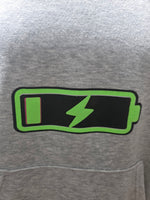 Close-up of green battery and lightning front print