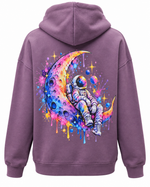 Mauve purple women's hoodie back showing colorful astronaut seated on crescent moon print