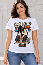 Female model wearing a white Social Battery 1% cotton T-shirt with long-haired charging character, orange and blue details.