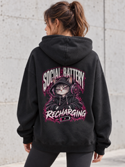 Female model wearing a black Social Battery Recharging women's hoodie, back view